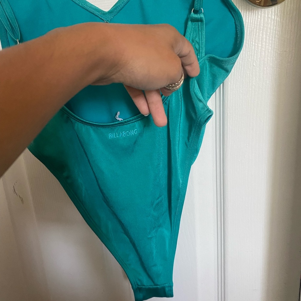 One piece, teal billabong, cheekers, swimsuit, size small.